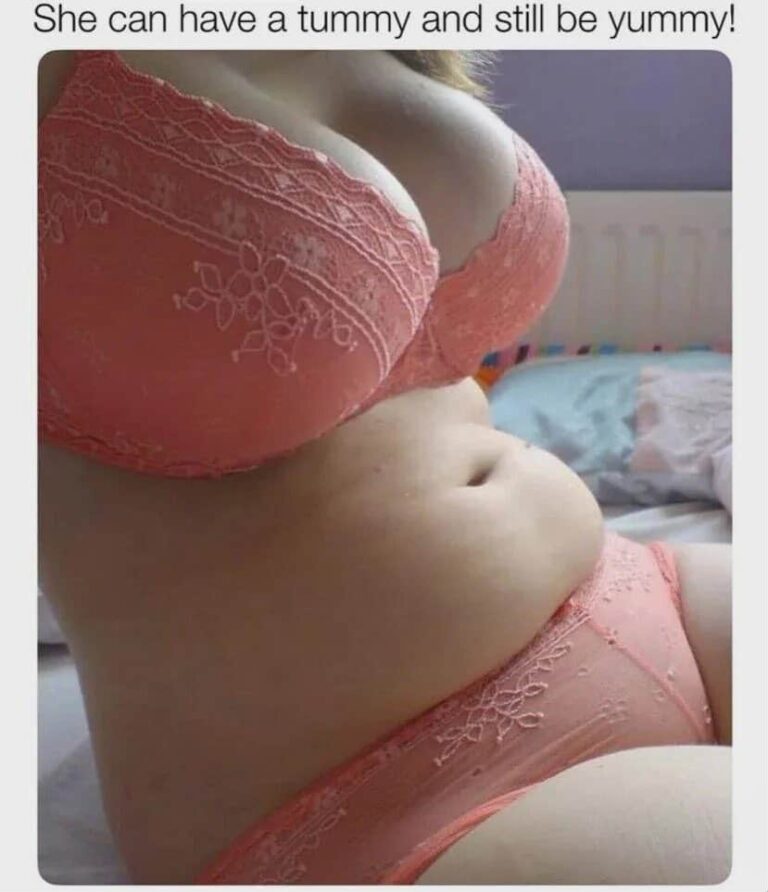 Carol Vorderman highlights her toned midsection and shapely curves.